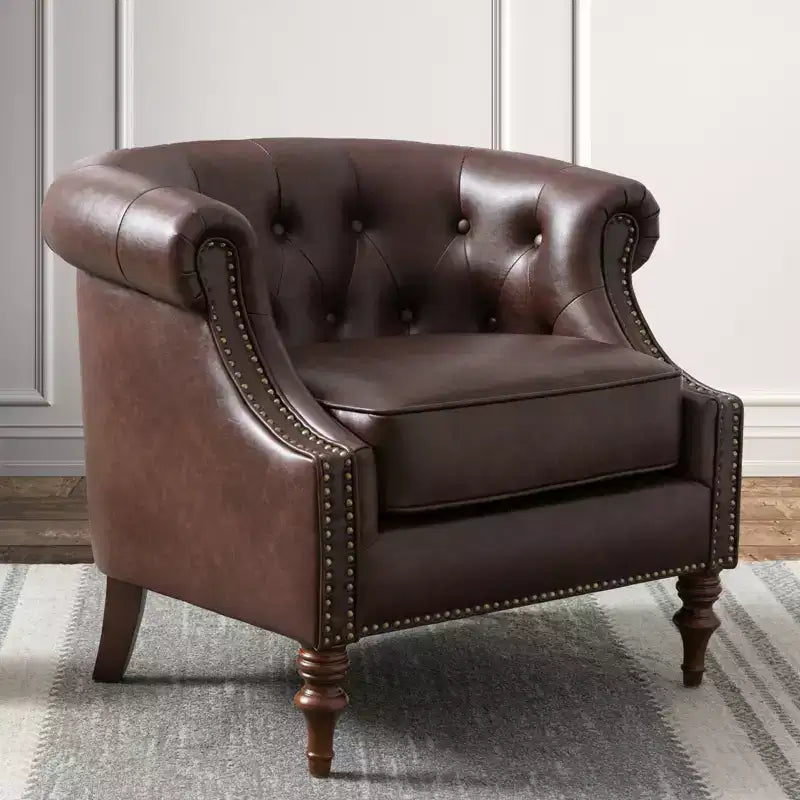 Fauteuil crapaud en similicuir capitonné