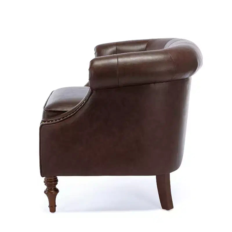 Fauteuil crapaud en similicuir capitonné
