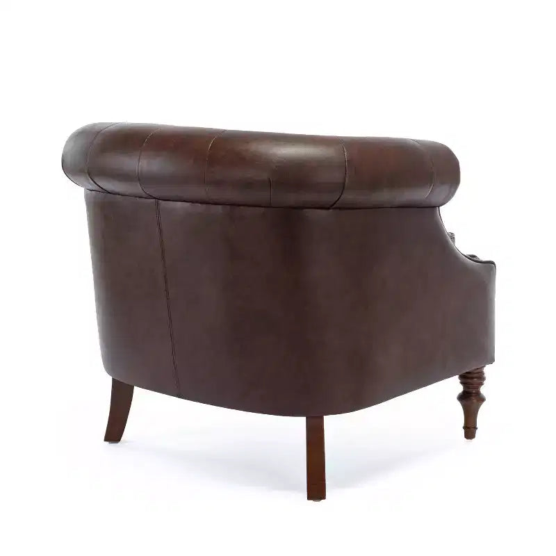 Fauteuil crapaud en similicuir capitonné