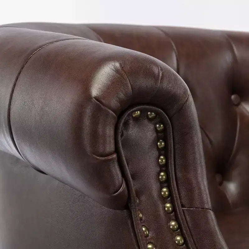 Fauteuil crapaud en similicuir capitonné
